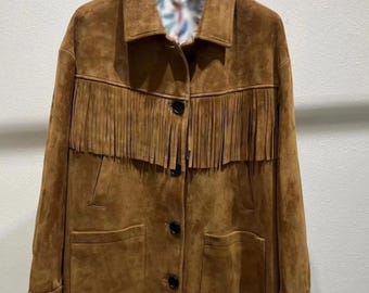 Dammockajacka med fransar i läder och västerländsk boho vintage cowgirl brun pärlstavskappa med tofsar