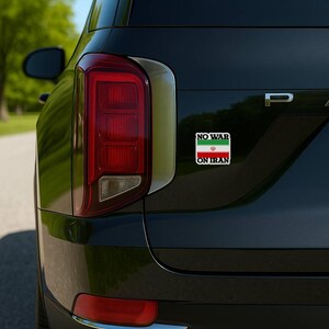No War On Iran waterproof vinyl car decal with Iranian flag design on black SUV rear panel