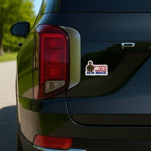 In a World Full of Donalds Be a Bruce political car sticker anti Trump vinyl decal on black SUV tailgate