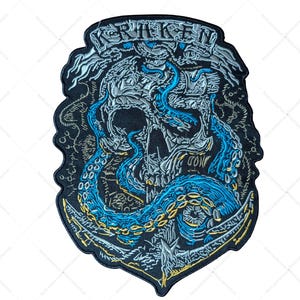 May include: Embroidered patch featuring a skull with blue tentacles and the word "KRAKEN" at the top. The design includes an anchor and intricate details in shades of blue, gray, and yellow on a black background.