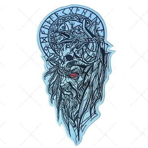 May include: A detailed black and white patch featuring a stylized Viking warrior with a long beard, red eyes, and a wolf or dragon motif. The design includes runic symbols and intricate linework, set against a light blue background.