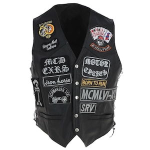 May include: Black leather motorcycle vest with various embroidered patches, including "MCD EXRS", "iron horse", "MOTOR CYCLES", "BORN TO RUN", "MCMLVI-X", "SRV", "STURGIS 1990", "Bonne Mutt Salope", and "EVOLUTION".