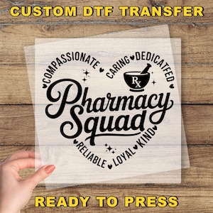 May include: A DTF transfer with the words "Pharmacy Squad" in a heart shape, surrounded by words like "compassionate" and "reliable." A mortar and pestle graphic is at the top. The text "Custom DTF Transfer" and "Ready to Press" are also present.
