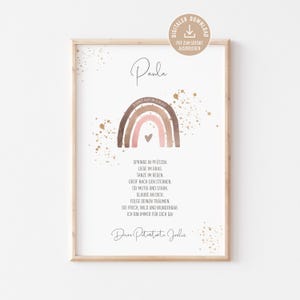 Könnte beinhalten: Gerahmter Kunstdruck mit einem Aquarell-Regenbogen in Braun- und Rosatönen und einem kleinen Herz. Der Druck enthält den Namen "Paula" und inspirierenden deutschen Text mit goldenen Spritzern. Oben rechts befindet sich ein Symbol für den digitalen Download.
