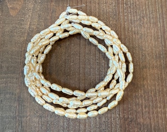 Vintage Miriam Haskell Baroque Rice Pearls in Cream by the strand