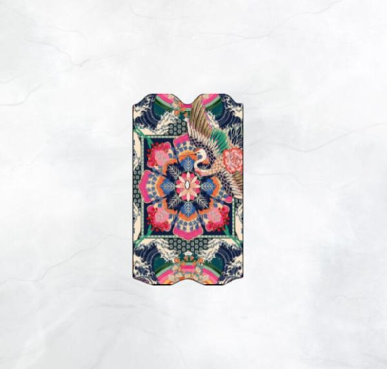 May include: A colorful patterned fabric with a floral design and a bird in the center. The fabric is in shades of blue, pink, green, and white.