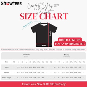 May include: A black t-shirt size chart with imperial and metric measurements. The chart includes width, length, and sleeve length in inches and centimeters. The text reads "Comfort Colors 1717 T-Shirt SIZE CHART." It also says "Order a size up for an oversized fit."