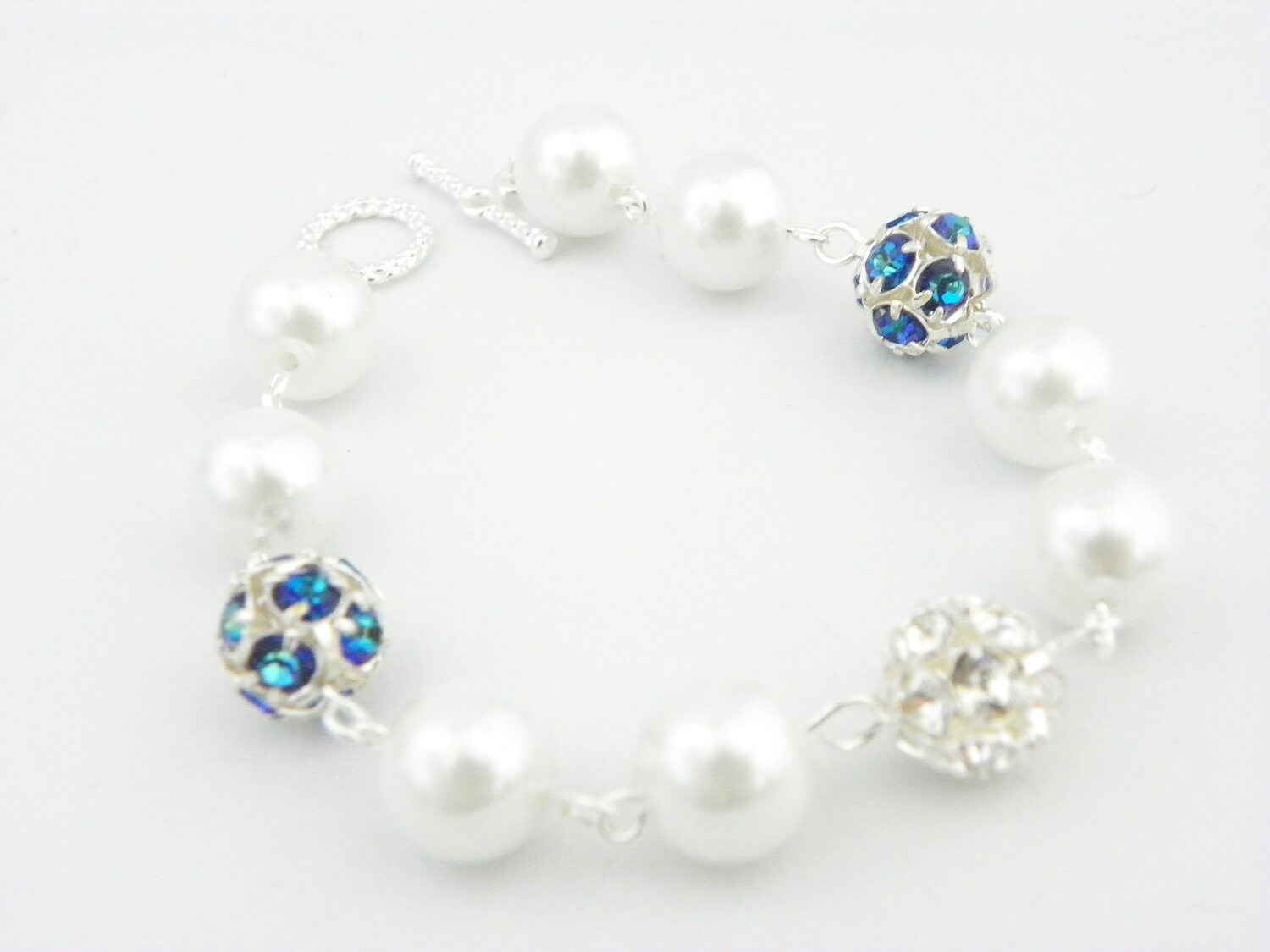 Details about   Peacock Pearl Bracelet With White Pearl Centerpiece 
