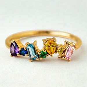 Colorful cocktail ring on finger, bridal jewelry gift for women