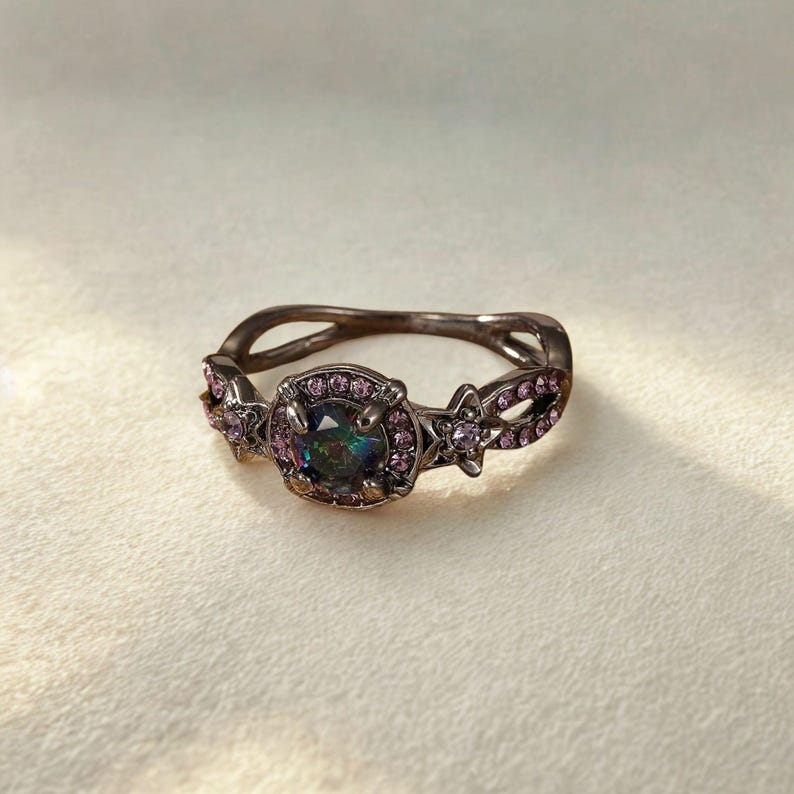 close-up of opal witch ring – mystical gothic gemstone style