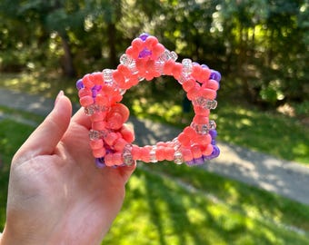Brazalete Kandi con estrellas rosas, moradas y transparentes