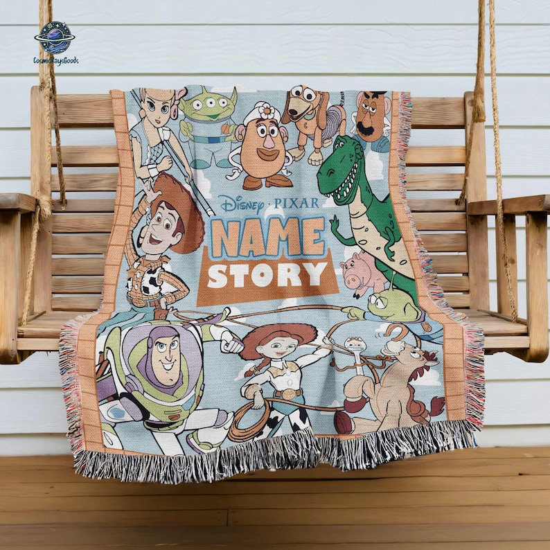 A Disney Pixar-themed blanket featuring characters from Toy Story, including Woody, Buzz Lightyear, and other beloved characters from the animated film franchise.