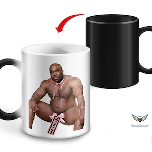 Barry Wood Wearing Coquette Heat Changing Mug, Colour Changing Barry Woods Wood Sitting on a Bed Ceramic Mug Rude Mug