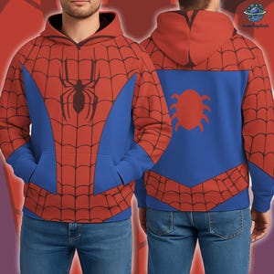 A man wearing a Spiderman hoodie with a spider design on the chest and a spider web pattern on the back.