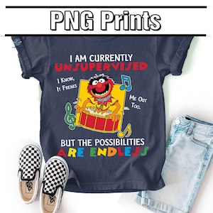 May include: A navy blue t-shirt featuring a cartoon character playing a drum, with the text "I AM CURRENTLY UNSUPERVISED." The image includes checkered slip-on shoes and denim shorts. The text "BUT THE POSSIBILITIES ARE ENDLESS" is also visible on the shirt.