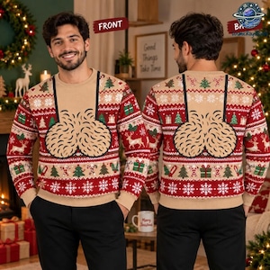 May include: A beige long-sleeve knit jumper featuring a red and white festive pattern with Christmas trees, reindeer, and gift boxes. The centre displays a large, tan, textured graphic design. The jumper is labelled with FRONT and BACK text.