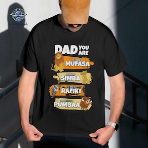 May include: A set of three ceramic mugs with a speckled, cream-colored glaze. Each mug features a different hand-painted design: a blue and green leaf, a yellow flower, and a red berry. The mugs have a simple, rounded shape.