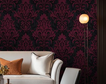 May include: A living room interior with a white couch and a black and burgundy damask patterned wallpaper. A floor lamp with a round, white globe shade stands next to the couch. A coffee table with a marble top sits in front of the couch.