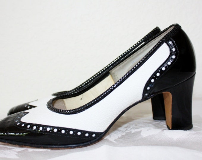 spectator pumps black white