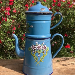 Large antique coffee pot in blue enamelled metal with carnations, foliage and gold decorations