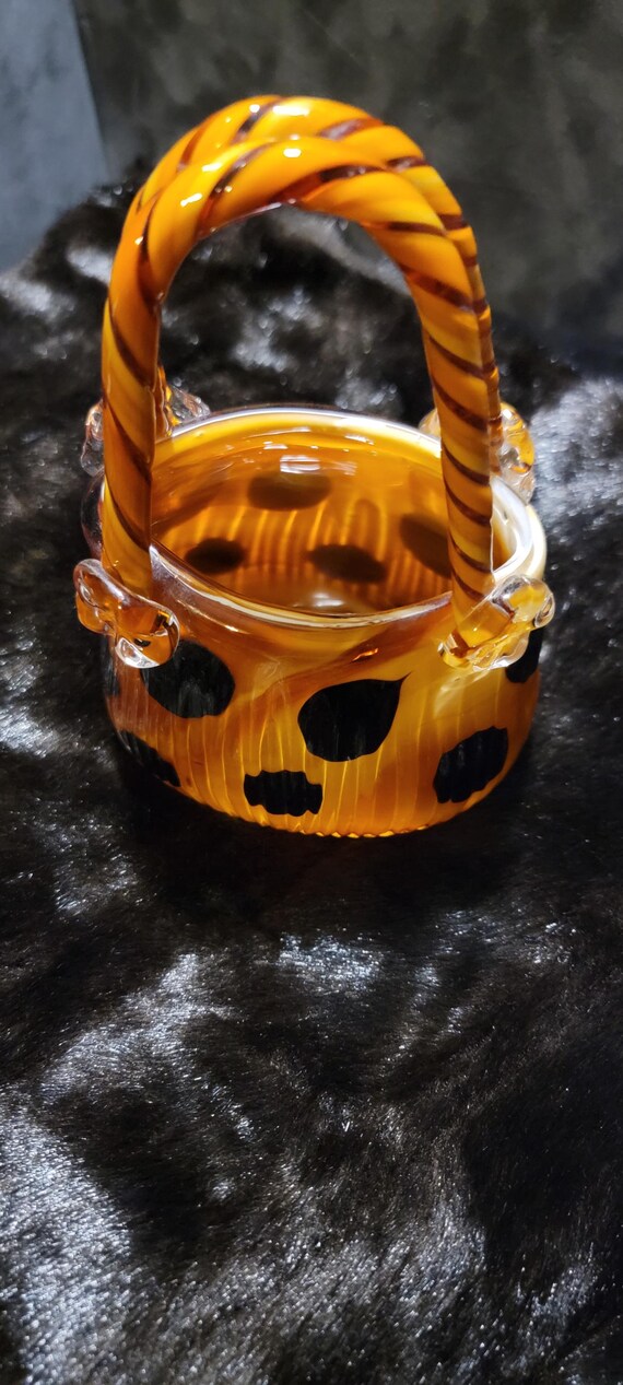 Murano-style hand-blown glass purse sculpture in amber with black polka dots — mid-century inspired collectible art glass