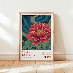 May include: Framed art print of a red peony with a yellow centre and green leaves. The background has a blue and green dotted pattern. Text includes "Yayoi Kusama Tokyo" and Japanese characters.