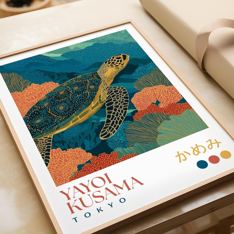Close-up of the framed sea turtle print lying flat on a wrapping table. The intricate dot detailing and vivid coral textures are clearly visible.