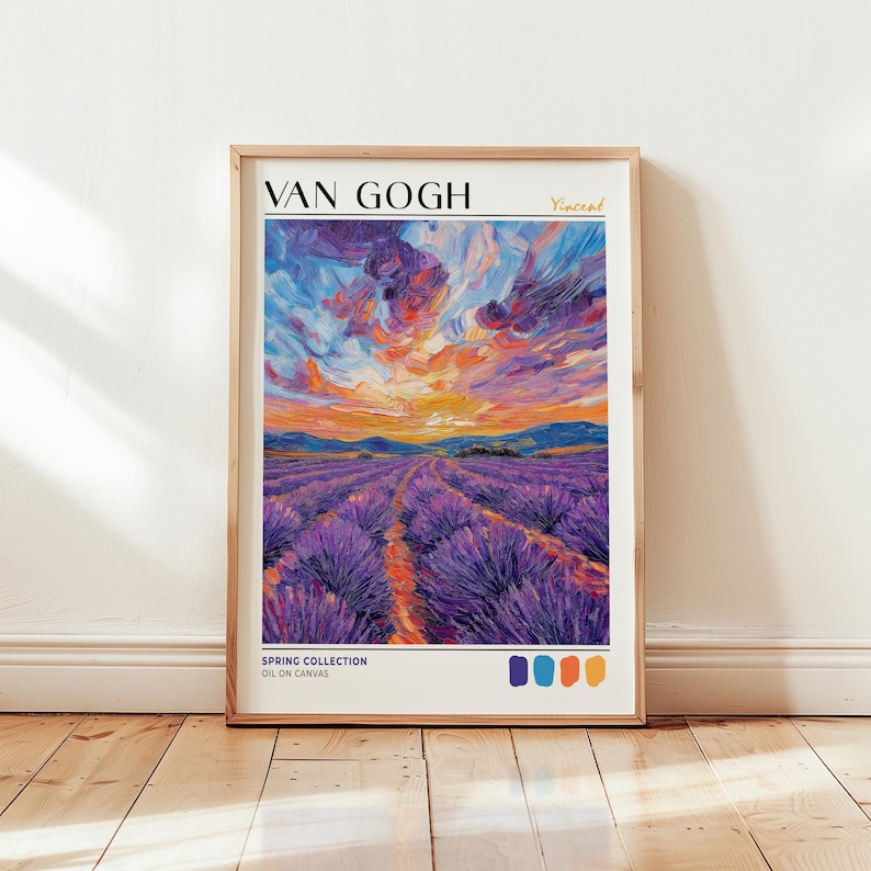 Van Gogh-style lavender field print leaning against a white wall on wooden flooring. The artwork features bold purple rows under a dramatic swirling sunset sky in orange, pink, and violet. "VAN GOGH" text and four color swatches—violet, navy, orange, and gold—line the bottom. Natural light enhances the rich brushstrokes and texture.