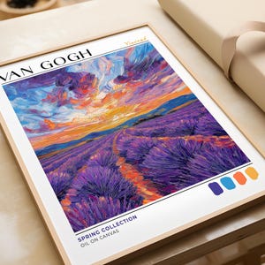 Lavender landscape print in Van Gogh style shown flat on a tabletop, mid-wrap. Swirling purple fields lead to a vibrant sunset with expressive blue and coral skies. Bold serif text and four color swatches appear along the bottom. Neutral surface and packaging create a polished, studio feel.
