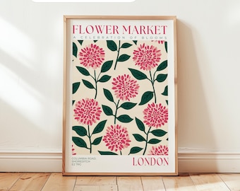 May include: A framed poster with a floral pattern. The design features pink flowers with green stems and leaves on a cream backdrop. The text at the top says "FLOWER MARKET A CELEBRATION OF BLOOMS". The word "LONDON" is at the bottom.