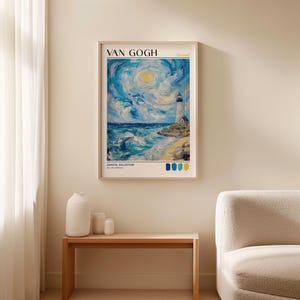 Van Gogh-style coastal poster in a light wooden frame, mounted on a beige wall above a simple wooden bench with minimalist white vases. The artwork features a lighthouse overlooking a dynamic seascape with swirling skies and textured waves in shades of blue, teal, and yellow. Labeled “Coastal Collection” with four paint swatches beneath.