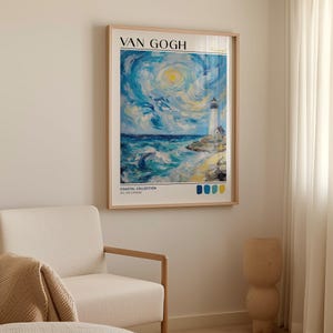 Van Gogh-style coastal art print hanging in a light wooden frame above a cream armchair with a beige throw. The vivid painting shows a lighthouse by the sea under a swirling sky, painted in textured blue, yellow, and white brushstrokes. The lower section of the print reads “Coastal Collection” and includes a palette of four coastal tones.