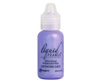 May include: A small bottle of lavender-colored pearlescent paint labeled "Liquid Pearls Dimensional Pearlescent Paint Lavender Lace" by Ranger.