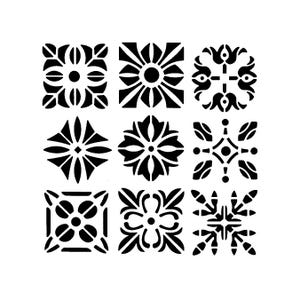 May include: Nine black and white square tile designs with floral and geometric patterns. Each tile features a unique symmetrical design, including stylized flowers, sunbursts, and abstract shapes. The designs are set against a white background.
