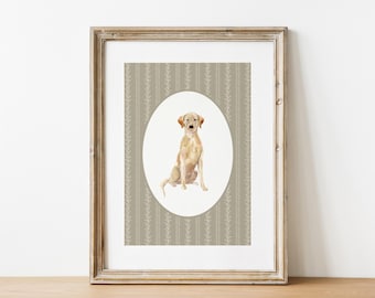 May include: A framed print with a watercolour painting of a golden Labrador Retriever. The dog is sitting inside an oval shape against a patterned background. The frame is a light brown colour.