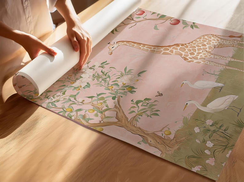May include: A roll of wallpaper with a whimsical design featuring a giraffe, birds, and a tree with fruit. The wallpaper has a soft pink background with green and brown accents. The image shows the wallpaper being unrolled.