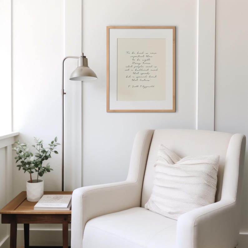 May include: A framed print with a white background and black text. The text reads "To be kind is more important than to be right. Many people are right but a brilliant mind is not a brilliant heart. That special kind of light that shines from the inside." - F. Scott Fitzgerald.
