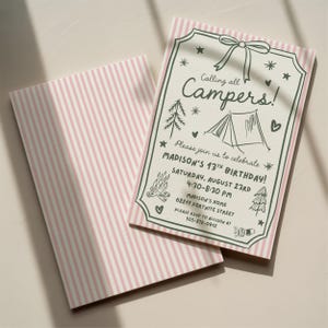 May include: A rectangular birthday invitation card with a pink and white vertical striped border. The center features dark green hand-drawn illustrations of a tent, campfire, trees, and stars, with the text Calling all Campers! Madison's 13th Birthday.
