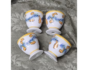 Juego de 4 hueveras de porcelana vintage con espirales de hiedra amarilla y azul