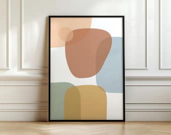 May include: Abstract art print in a black frame. The artwork features overlapping organic shapes in muted colours: peach, terracotta, blue, sage green, and mustard yellow. The shapes are set against a white background.