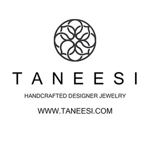 May include: Black and white logo for Taneesi, a handcrafted designer jewelry company. The logo features a stylized floral design and the company name and website address: www.taneesi.com.