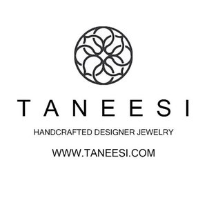 May include: Black and white logo for Taneesi, a handcrafted designer jewelry company. The logo features a stylized floral design and the company name and website address: www.taneesi.com.