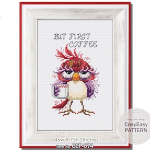 May include: Cross-stitch pattern framed in a red and white border. The design features a whimsical bird with glasses holding a coffee cup, with the text "BUT FIRST COFFEE". The pattern is 46w x 75h stitches.