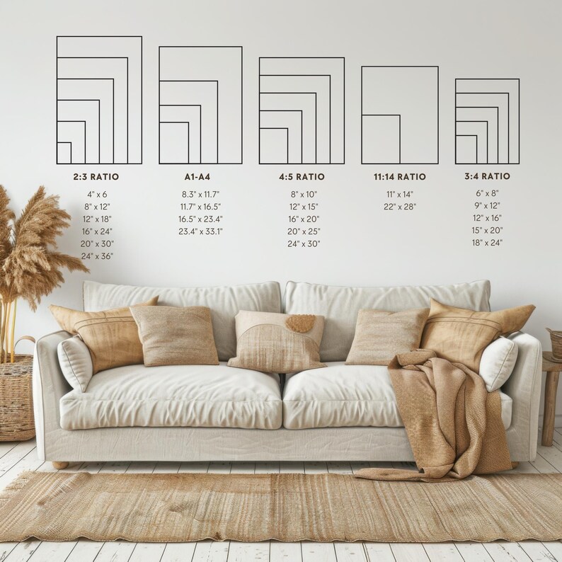 May include: A white sofa with three cushions and a throw blanket. A chart on the wall shows different aspect ratios for artwork with corresponding measurements in inches. The chart includes 2:3, A1-A4, 4:5, 11:14, and 3:4 ratios.