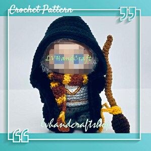 May include: A crocheted doll dressed in a black hooded robe and a scarf with yellow and maroon stripes. The doll is holding a brown broom. The text "Crochet Pattern" is at the top of the image.