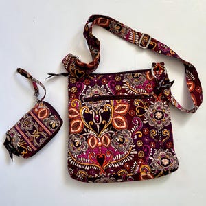 Conjunto de cartera y billetera Vera Bradley en excelente estado