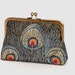 see more listings in the Peacock clutch section