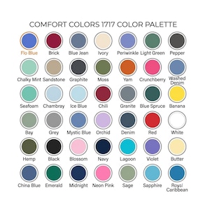 May include: A color palette chart titled COMFORT COLORS 1717 COLOR PALETTE, featuring forty-two circular color swatches arranged in a grid. Each circle is labeled with its corresponding color name, including Flo Blue, Brick, Blue Jean, Ivory, Periwinkle, Light Green, Pepper, Chalky Mint, Sandstone, Graphite, Moss, Yam, Crunchberry, Washed Denim, Seafoam, Chambray, Ice Blue, Chili, Granite, Blue Spruce, Banana, Bay, Grey, Mystic Blue, Orchid, Denim, Red, White, Hemp, Black, Blossom, Navy, Lagoon, Violet, Butter, China Blue, Emerald, Midnight, Neon Pink, Sage, Sapphire, and Royal Caribbean.