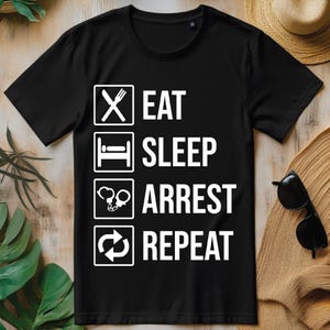 Grappige politieagent eet slaapstop Herhaal, png, grappig agent T-shirtontwerp