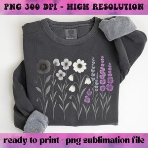 May include: Dark gray sweatshirt featuring a floral design with black, white, and purple flowers. The text "PNG 300 DPI - HIGH RESOLUTION" and "ready to print - png sublimation file" are displayed at the top and bottom of the image.
